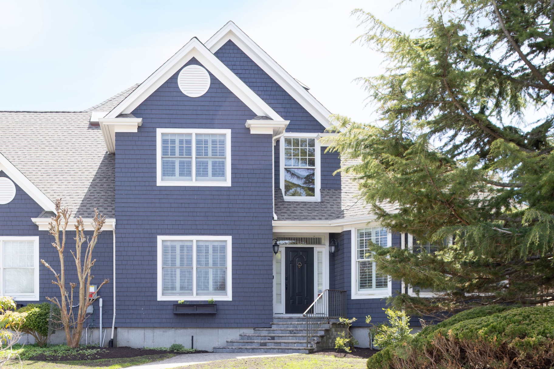 Slate-blue shingle exterior with white trim
