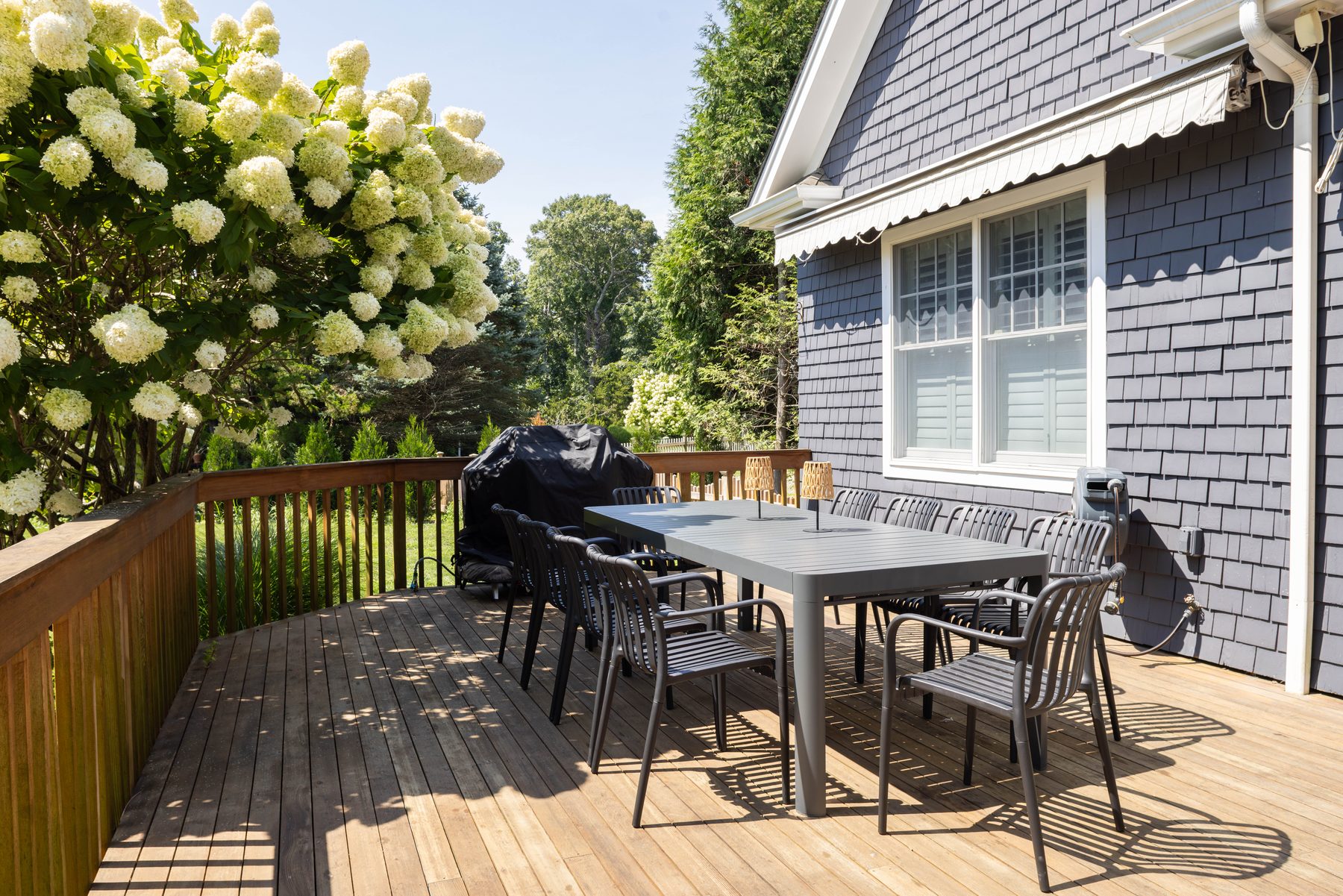 Back deck with grill and outdoor dining